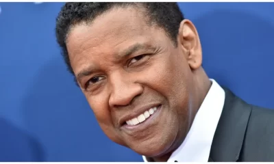 Female fans are drooling over new photos of Denzel Washington in a suit.