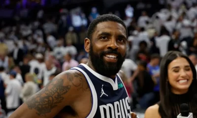 Kyrie Irving of the NBA Dallas Mavericks signs his dad to a shoe deal