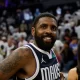 Kyrie Irving of the NBA Dallas Mavericks signs his dad to a shoe deal