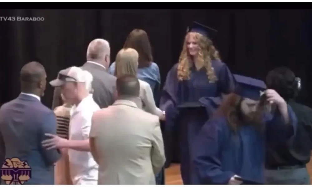 White Father Storms Stage During High School Graduation