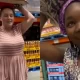 White Adoptive Mother Sparks Outrage By Directing Black Child to Carry Bag of Rice on Her Head