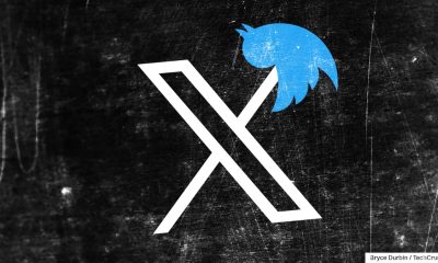 X logo impaling twitter bird logo