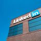 View of main building with logo and signage at the headquarters of professional social networking company LinkedIn