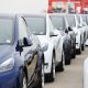 Teslas, which will be sent to the Port of Zeebrugge in Belgium, wait to be loaded on board the cargo vessel Theben operated by Wallenius Wilhelmsen at Nangang port.