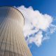 Cooling tower at nuclear power plant emits steam.