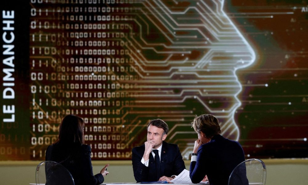 French President Emmanuel Macron answers questions of French Journalist Laurent Delahousse and Indian Journalist Palki Sharma Upadhyay during a televised interview broadcasted on TV channel France 2 and in India on the eve of the Artificial Intelligence (AI) Action Summit, at the Grand Palais, in Paris, on February 9, 2025.