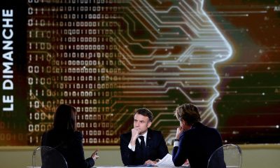 French President Emmanuel Macron answers questions of French Journalist Laurent Delahousse and Indian Journalist Palki Sharma Upadhyay during a televised interview broadcasted on TV channel France 2 and in India on the eve of the Artificial Intelligence (AI) Action Summit, at the Grand Palais, in Paris, on February 9, 2025.