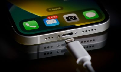 A Apple Lightning port charging cable is seen with with an iPhone in this illustration photo in Warsaw, Poland on 05 October, 2022.