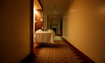 Room service trolley in hotel hallway